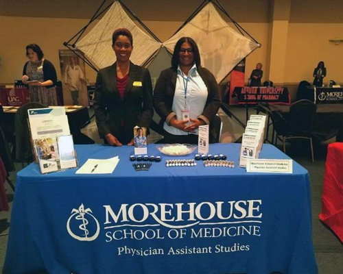 Two women share information about MSM's Physician Assistant Studies