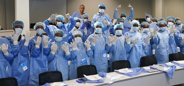 students wearing white gloves