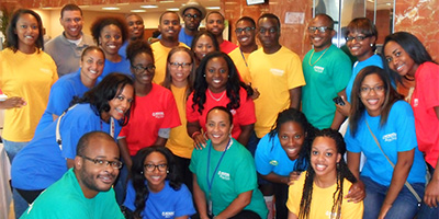 a group of students in bright t-shirts