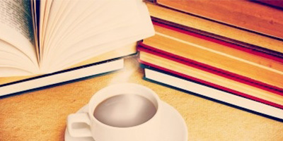 a book and cup of coffee