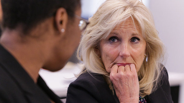 Jill Biden listens to a student talking