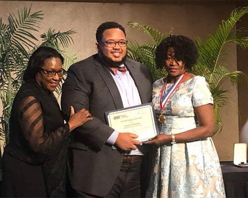 Kamron Robinson receives a 2019 NMA Emerging Scholars Award