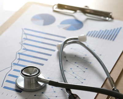 a stethoscope laying on a chart
