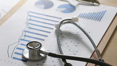 a stethoscope laying on a chart