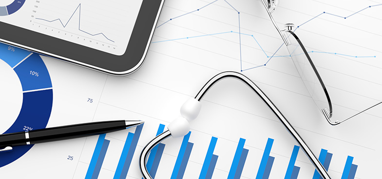 data and charts under a stethoscope