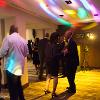attendees dance at the 2015 holiday party
