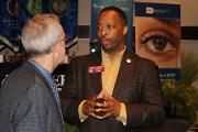 Eric Green, M.D., Director, NHGRI, with Rep. Derrick Jackson (District 64)