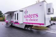 Sister by Choice mobile clinic, founded by native Georgian, Dr. Rogsbert F. Phillips-Reed, provided free mammograms to women over 40 without health insurance