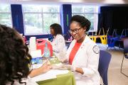 Mercer University College of Pharmacy provided blood pressure screenings and glucose checks