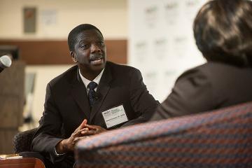 Roland Matthews, MD, chair of obstetrics and gynecology at Morehouse School of Medicine, leads patient-provider role play for clinical trial recruitment and participation. 