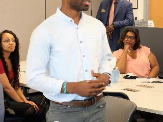 a man standing in a classroom