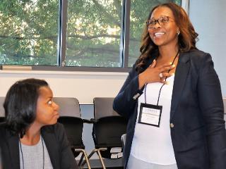 a woman talks to the class