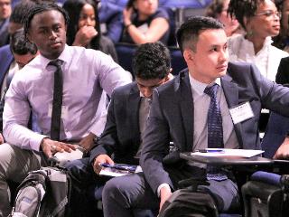 class of 2023 MD students listen to a speaker